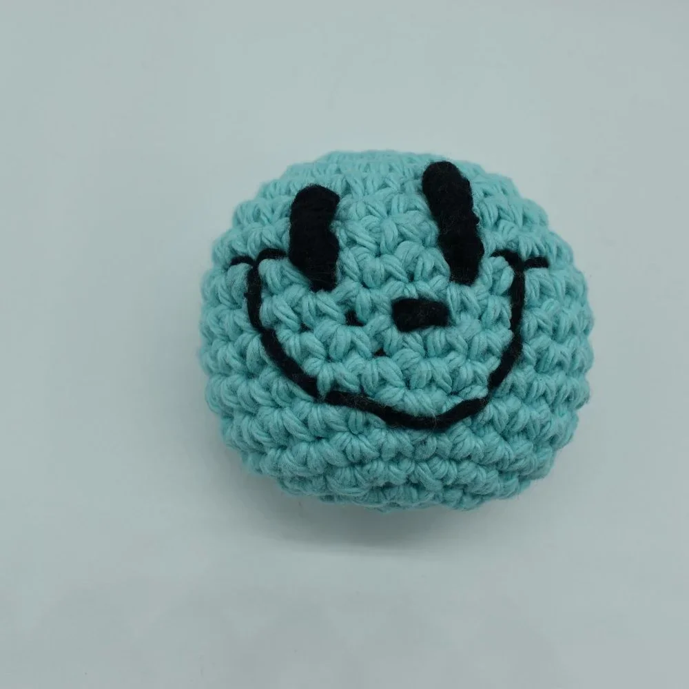 Handcrafted crochet catnip happy face cat toy